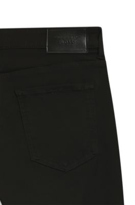 Pantalones Porsche x BOSS tapered fit de tejido vaquero el&aacute;stico, Negro