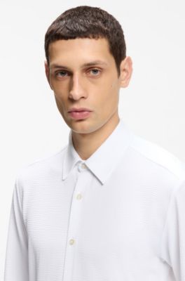 Camisa slim fit en tejido de sirsaca el&aacute;stica t&eacute;cnica italiana, Blanco
