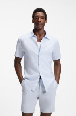 Camisa slim fit de lino el&aacute;stico con estampado floral, Celeste
