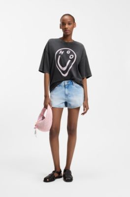 Camiseta de punto de algod&oacute;n con estampado de logo Happy HUGO con efecto fundido, Negro