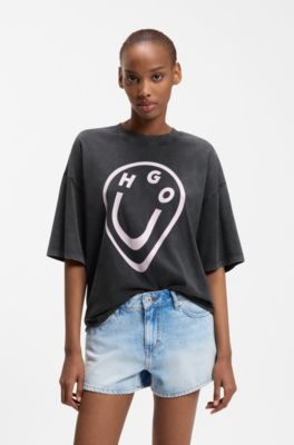 Camiseta de punto de algod&oacute;n con estampado de logo Happy HUGO con efecto fundido, Negro