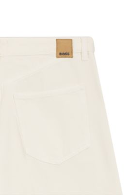 Wide-leg jeans in cream denim with front crease, White