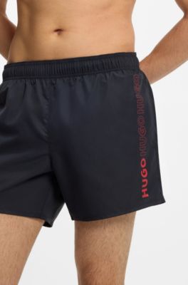 Quick-dry swim shorts with vertical printed logos, Black