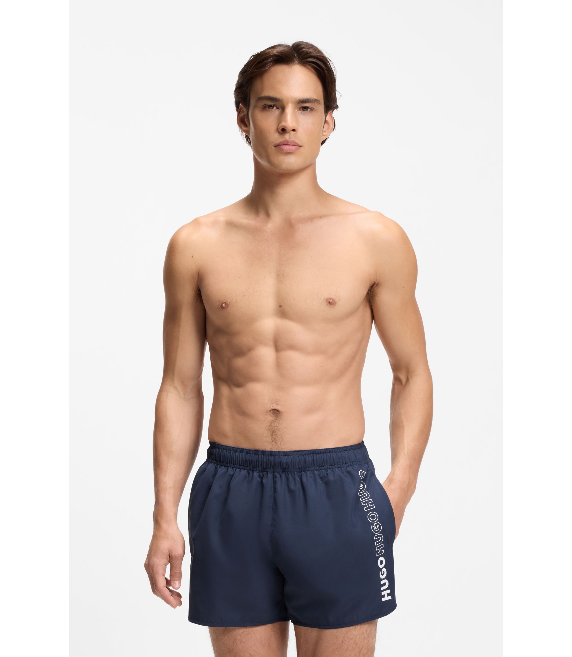 HUGO - Swim shorts with repeated logos - Dark Blue