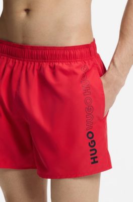 Ba&ntilde;ador tipo shorts con logos repetidos, Rosa claro