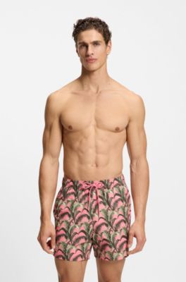 Swim shorts with all-over print, light pink