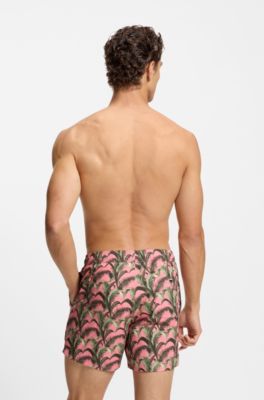 Swim shorts with all-over print, light pink