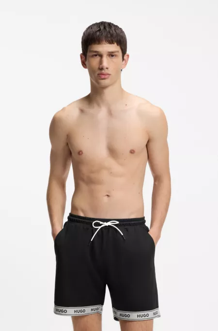 Mesh swim shorts with jacquard logo tape