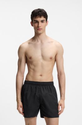 Swim shorts with all-over stacked logos, Black