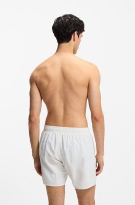 Swim shorts with all-over stacked logos, Light Beige