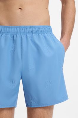 Ba&ntilde;ador tipo shorts de secado r&aacute;pido con logos grabados, Azul