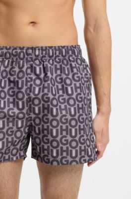 Quick-dry swim shorts with all-over print, light pink