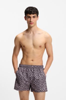Quick-dry swim shorts with all-over print, light pink