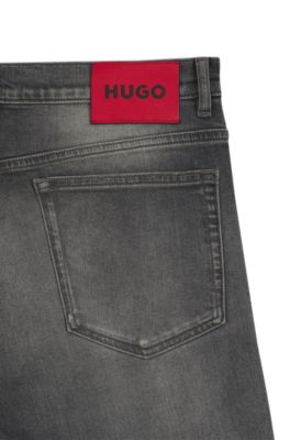 Jeans slim fit de algod&oacute;n el&aacute;stico negro, Plata