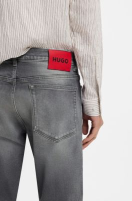 Jeans slim fit de algod&oacute;n el&aacute;stico negro, Plata