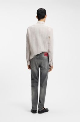 Jeans slim fit de algod&oacute;n el&aacute;stico negro, Plata