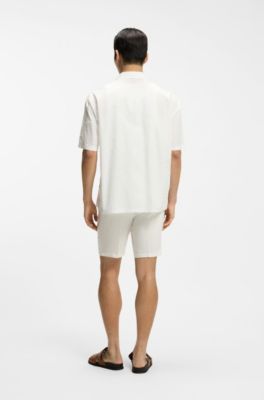Camisa relaxed fit de algod&oacute;n con bordado floral, Blanco