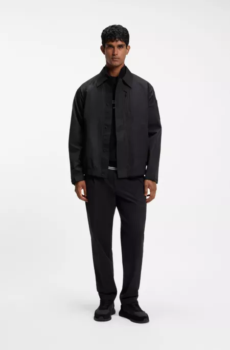 Water-repellent blouson jacket with welded front placket