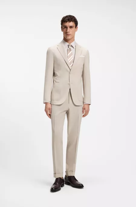 Tapered-fit trousers in wool-blend seersucker