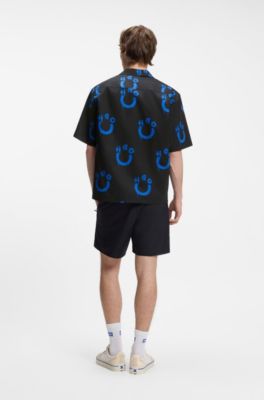 Chemise coupe d&eacute;contract&eacute;e &agrave; logo imprim&eacute;, Noir