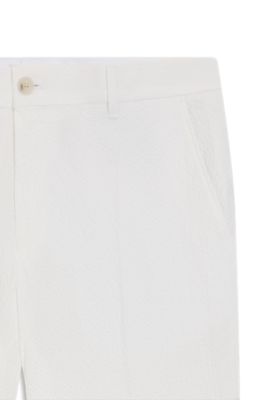 Tapered-fit trousers in stretch-cotton seersucker, White