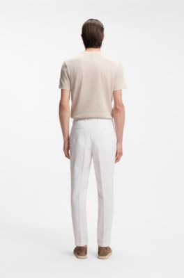 Tapered-fit trousers in stretch-cotton seersucker, White