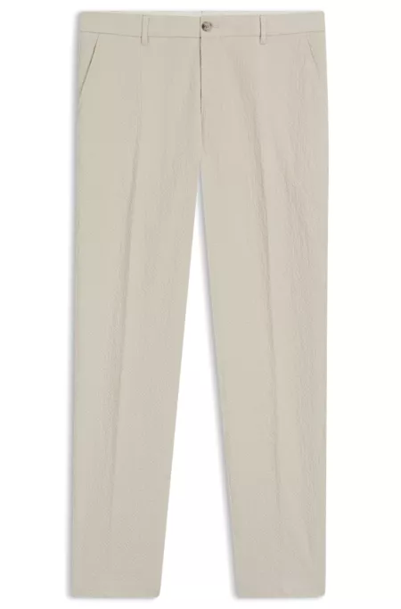 Tapered-fit trousers in stretch-cotton seersucker