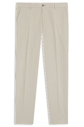 Pantalones tapered fit en sirsaca de algodón elástico