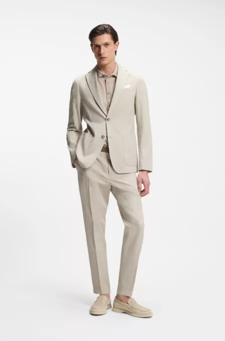 Tapered-fit trousers in stretch-cotton seersucker