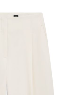 Relaxed-fit pants with pleat front, White