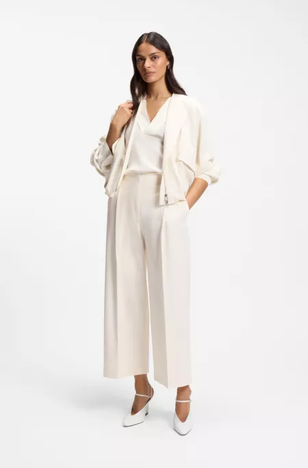 Relaxed-fit pants with pleat front