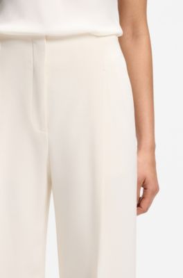 Relaxed-fit pants with pleat front, White