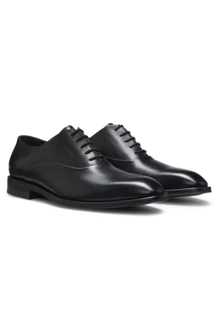 Leather Oxford shoes with perforated details