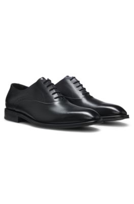Leather Oxford shoes with perforated details, Black