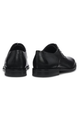 Leather Oxford shoes with perforated details, Black