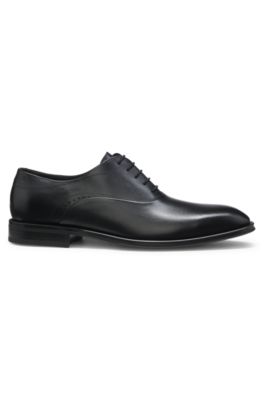 Leather Oxford shoes with perforated details, Black
