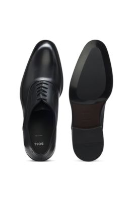 Leather Oxford shoes with perforated details, Black