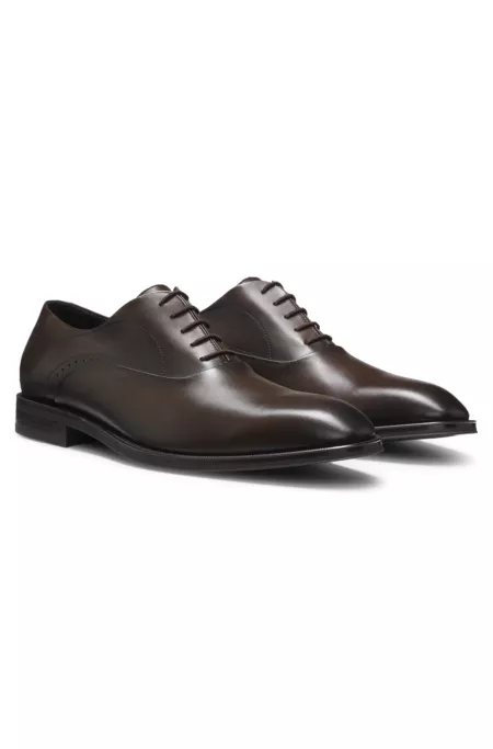 Leather Oxford shoes with perforated details