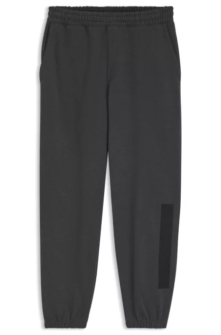 Relaxed-fit sweatpants in cotton with logo trim
