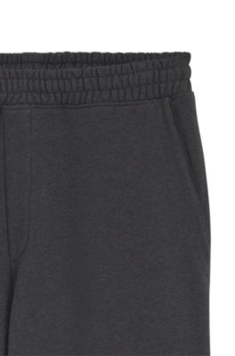 Pantalones de ch&aacute;ndal relaxed fit de algod&oacute;n con detalle de logo, Gris oscuro