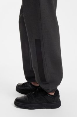 Relaxed-fit sweatpants in cotton with logo trim, Dark Grey