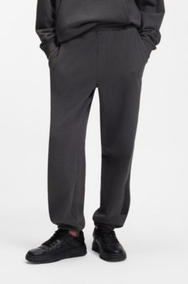 Relaxed-fit sweatpants in cotton with logo trim, Dark Grey