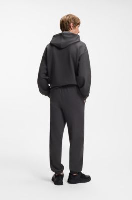 Relaxed-fit sweatpants in cotton with logo trim, Dark Grey