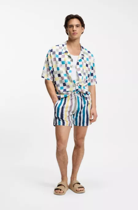 Faux-suede slides with logo detailing