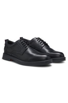 Derby shoes in leather with perforated monograms, Black