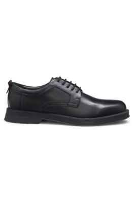 Derby shoes in leather with perforated monograms, Black