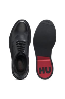 Derby shoes in leather with perforated monograms, Black