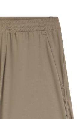 Active Stretch-fabric shorts with mesh pocket bags, Light Green
