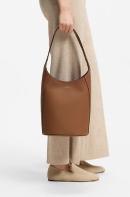 Leather bucket bag with metallic logo lettering, Brown
