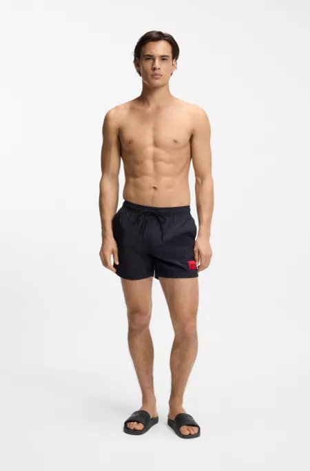 Italian-made slides with tonal logo